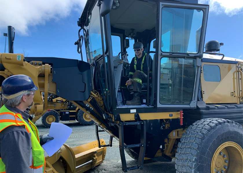 HDET Employer and Apprentice outside with HDET equipment